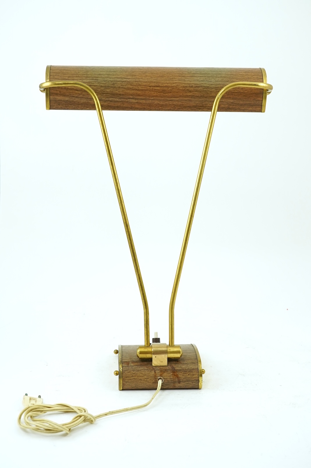 Eileen Gray (Irish, 1878-1976) for Jumo: A brass and wood veneer desk lamp